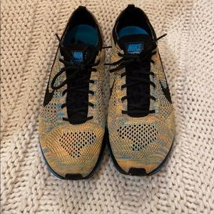 Nike Flyknit Racers in Sherbert